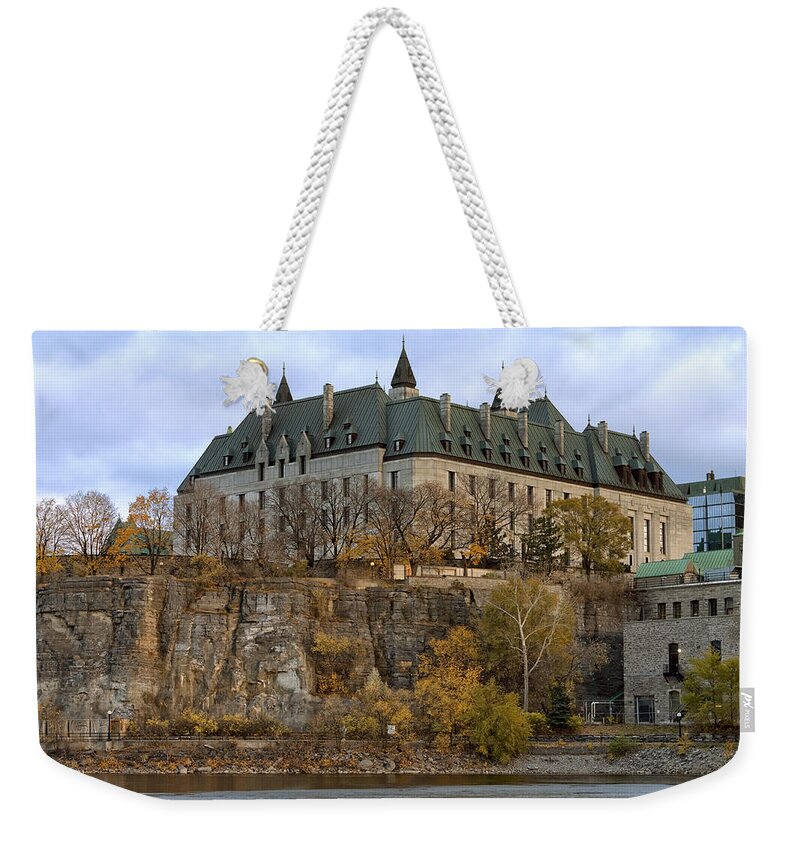 Court Weekender Tote Bag featuring the photograph Supreme Court by Eunice Gibb