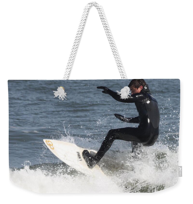 Surfer On White Water Weekender Tote Bag featuring the photograph Surfer on White Water by John Telfer