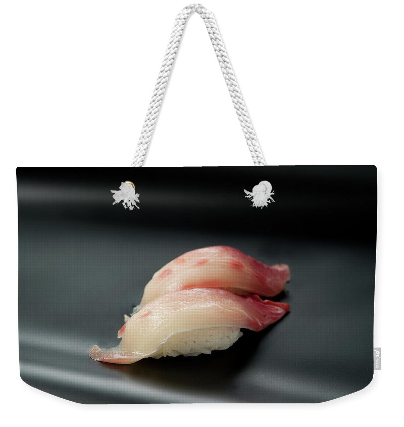 Black Background Weekender Tote Bag featuring the photograph Sushi Hamachi by Ryouchin