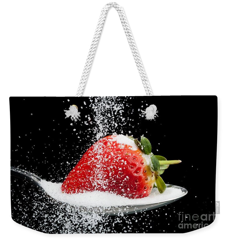 Strawberry Weekender Tote Bag featuring the photograph Sweet strawberry with sugar granules by Simon Bratt