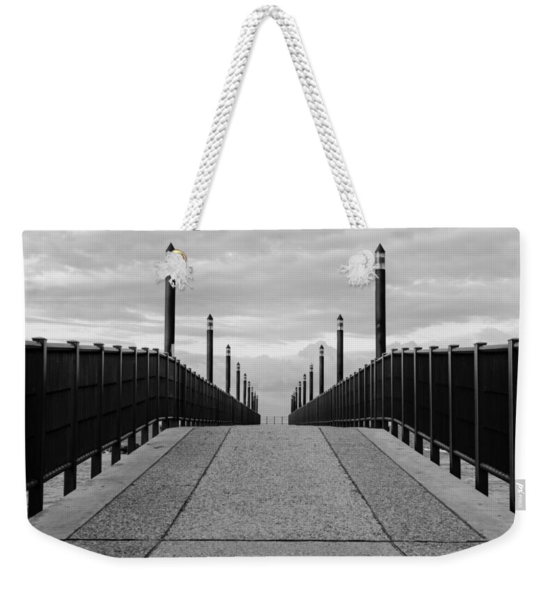 Monochrome Weekender Tote Bag featuring the photograph Symmetry in black and white by AM FineArtPrints