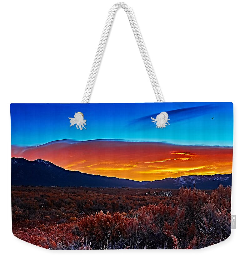 Sunrise Weekender Tote Bag featuring the photograph Taos sunrise X by Charles Muhle