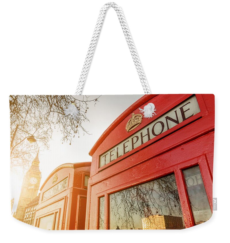 England Weekender Tote Bag featuring the photograph Telephone boxes and the Clock Tower in London by Dutourdumonde Photography