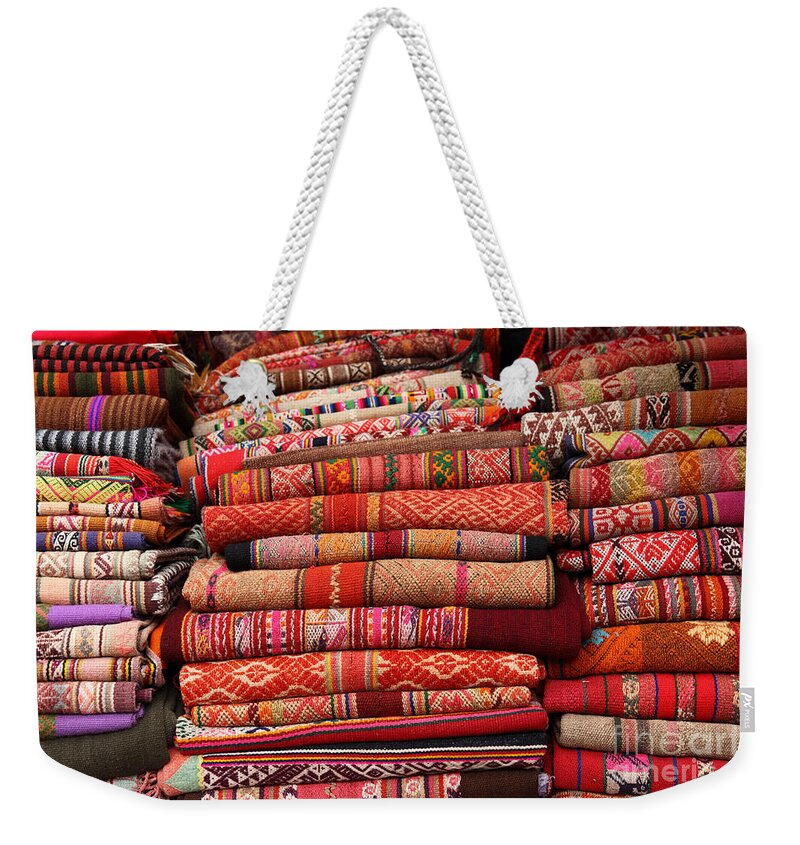 South America Weekender Tote Bag featuring the photograph Textile Textures by James Brunker