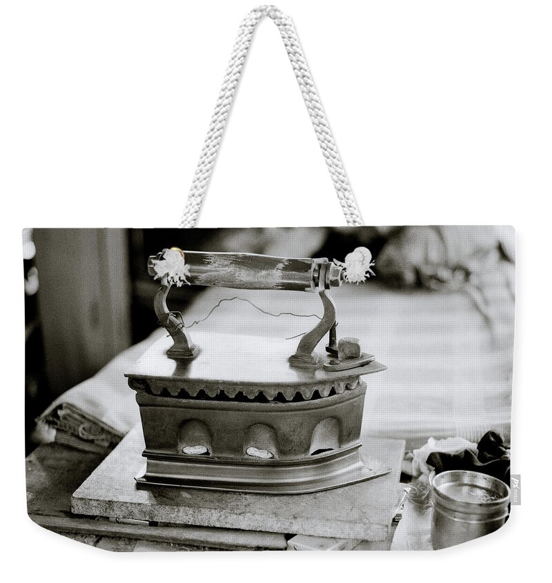 Antique Weekender Tote Bag featuring the photograph The Antique Iron by Shaun Higson