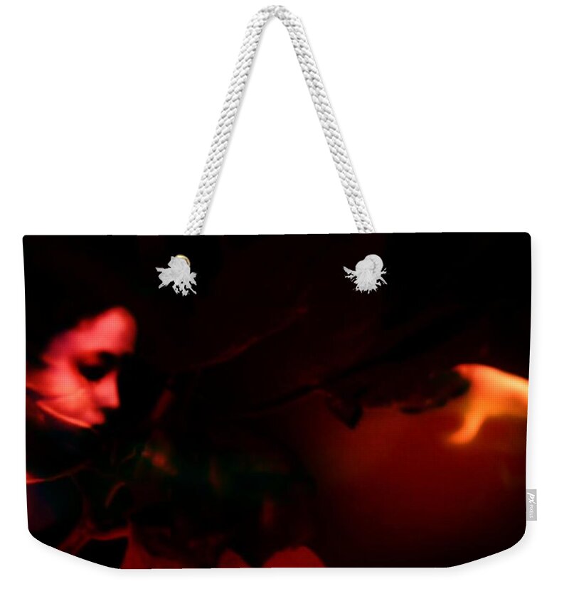 Red Weekender Tote Bag featuring the photograph The architect of red by Jessica S