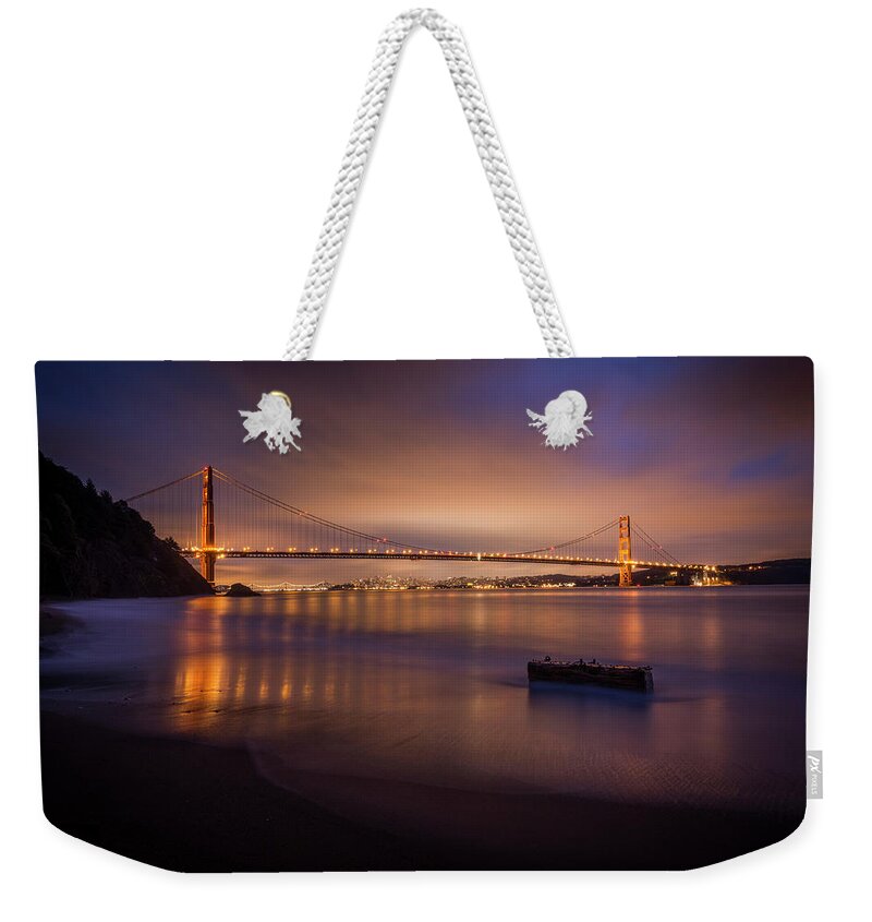 Water's Edge Weekender Tote Bag featuring the photograph The Blue Hour by Copyright Lorenzo Montezemolo