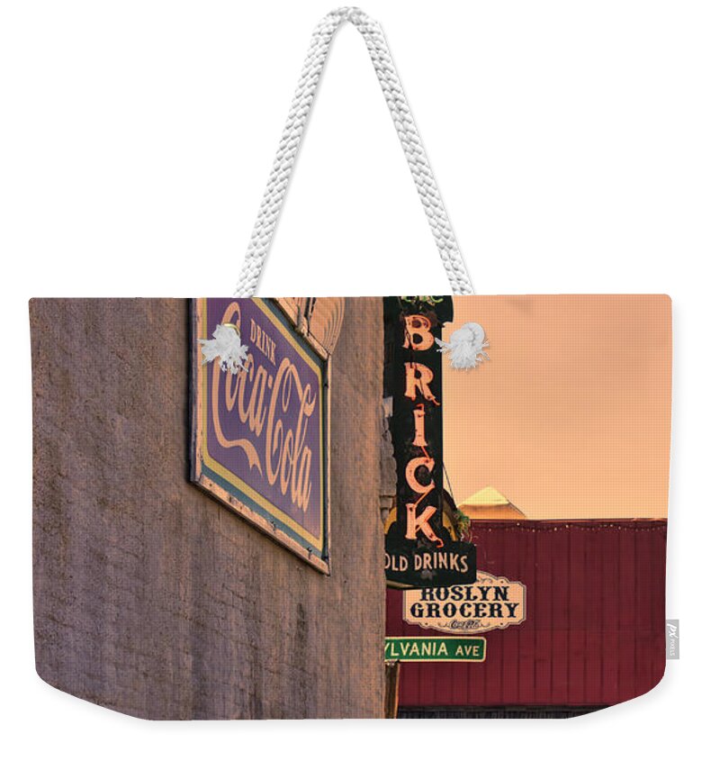 Pub Sign Weekender Tote Bag featuring the photograph The Brick at Sunset by Cathy Anderson