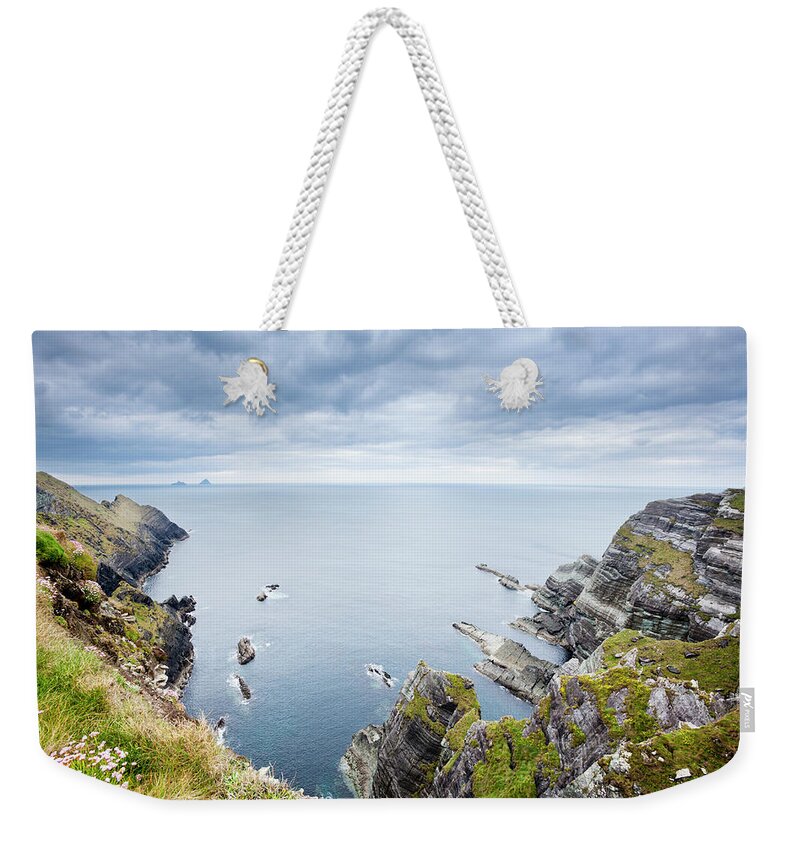 Water's Edge Weekender Tote Bag featuring the photograph The Cliffs Of Drumgour, County Kerry by Jorg Greuel