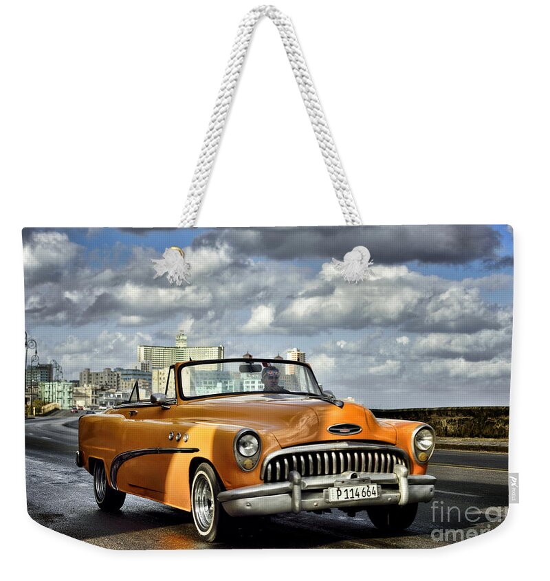 Habana Weekender Tote Bag featuring the photograph The colour ride by Jose Rey