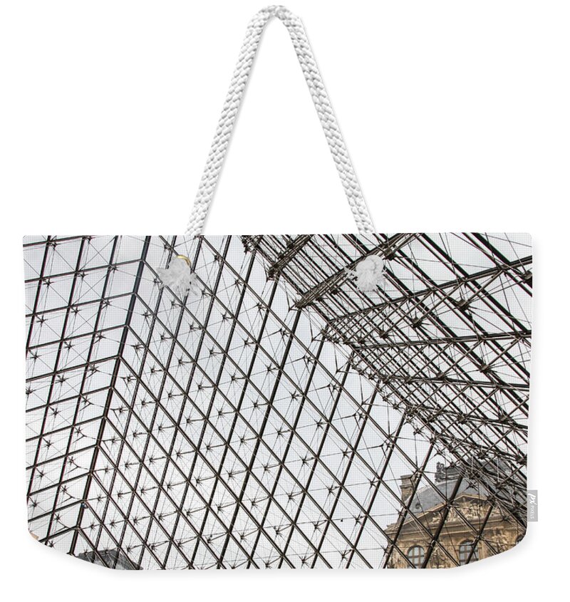 Louvre Weekender Tote Bag featuring the photograph The Embrace by Ross Henton