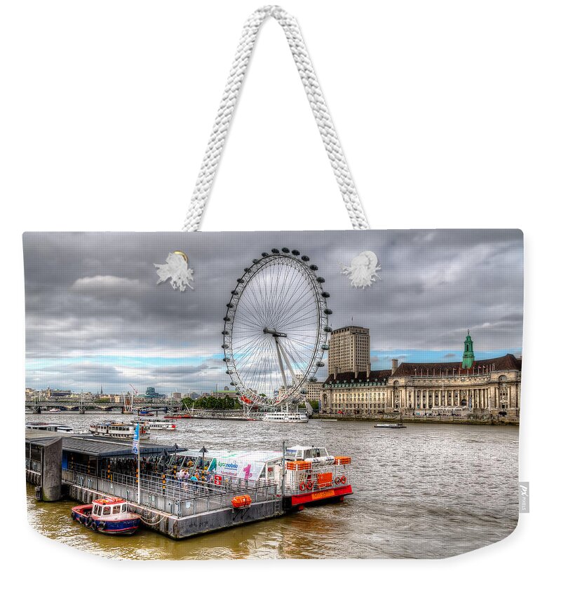 Tim Stanley Weekender Tote Bag featuring the photograph The Eye Across the Thames by Tim Stanley