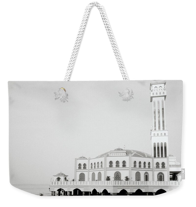 Religion Weekender Tote Bag featuring the photograph The Floating Mosque by Shaun Higson