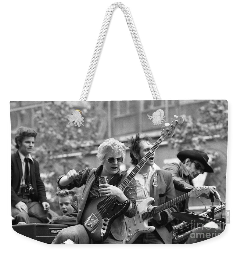 The Weekender Tote Bag featuring the photograph The Flying Saucers by David Fowler