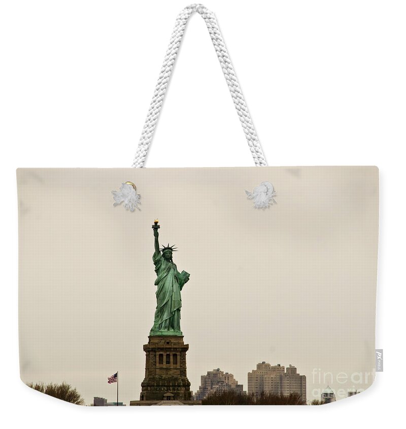 Statue Of Liberty In New York Weekender Tote Bag featuring the photograph The gift by Elena Perelman