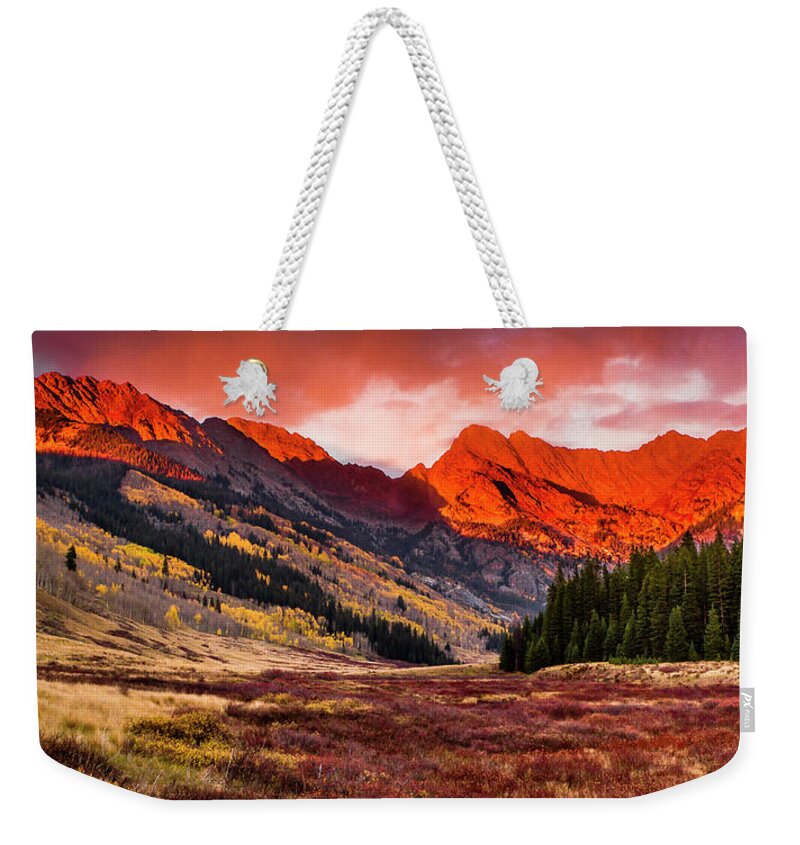 Scenics Weekender Tote Bag featuring the photograph The Gore Range On Fire With The Evening by C. Fredrickson Photography