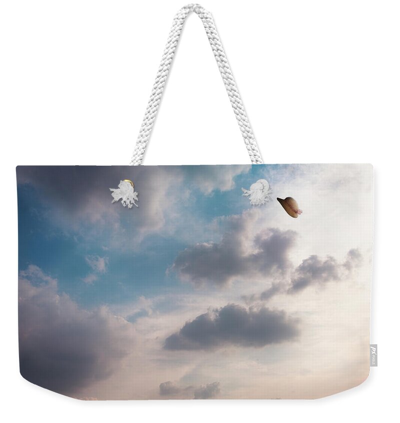 Sun Hat Weekender Tote Bag featuring the photograph The Hat Flying In The Sky by Hiroshi Watanabe