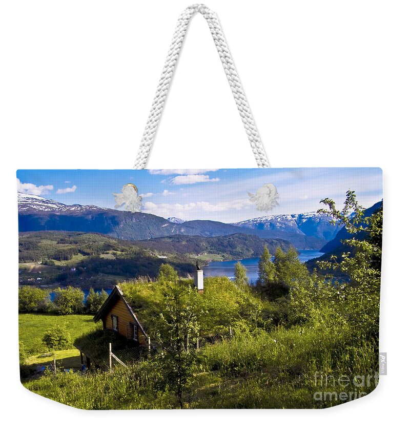 Europe Weekender Tote Bag featuring the photograph The house becomes a Landscape by Heiko Koehrer-Wagner