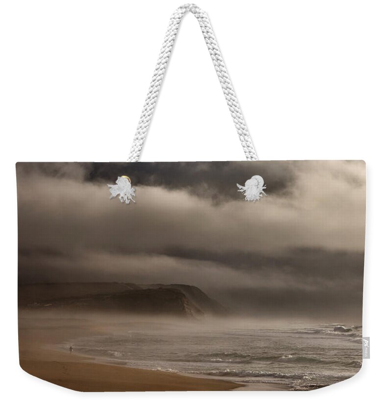 Clouds Weekender Tote Bag featuring the photograph The survivor by Jorge Maia