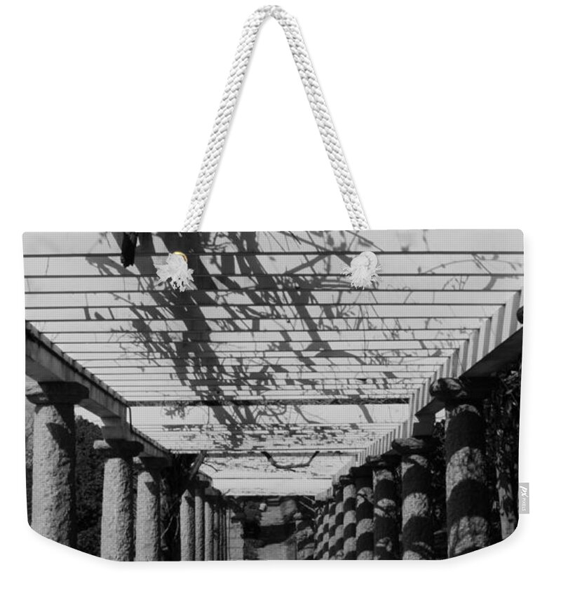 Bw Weekender Tote Bag featuring the photograph The long walk by Stacy Abbott