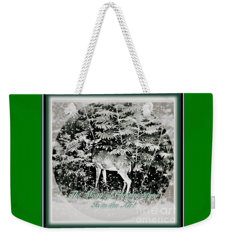 Young Doe Nuzzles Mimosa Lining Edge Of Woods Has Expression Of Gentleness Snow Falling Look Of Winter Perfect Christmas Card With Warm Weekender Tote Bag featuring the photograph The Magic of Christmastime in a Woodland by Kimberlee Baxter