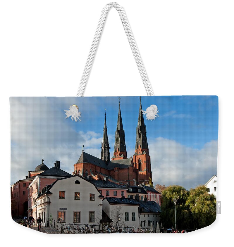 The Medieval Uppsala Weekender Tote Bag featuring the photograph The medieval Uppsala by Torbjorn Swenelius