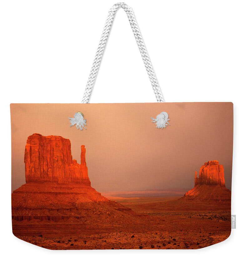 Tranquility Weekender Tote Bag featuring the photograph The Mittens In Monument Valley by Mark Newman
