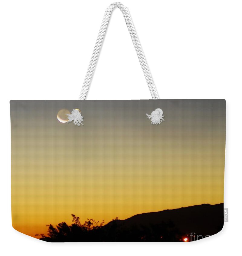 Night Weekender Tote Bag featuring the photograph The Night Moves On by Angela J Wright