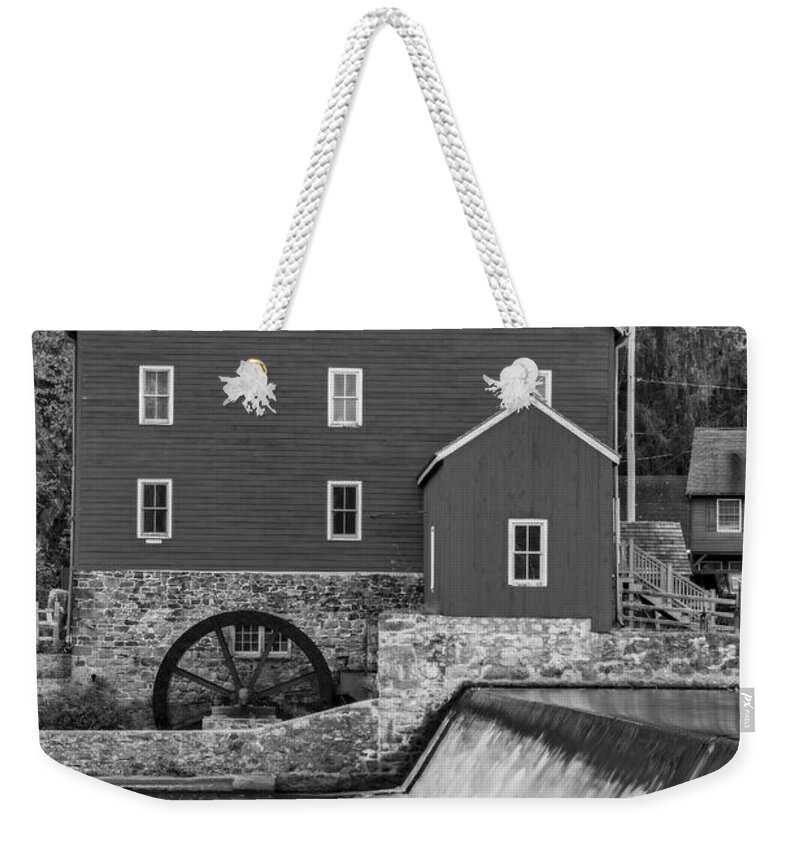 Clinton Weekender Tote Bag featuring the photograph The Red Mill At Clinton BW by Susan Candelario