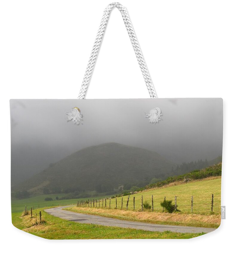 Mist Weekender Tote Bag featuring the photograph The Road Less Travelled by Mary Ellen Mueller Legault