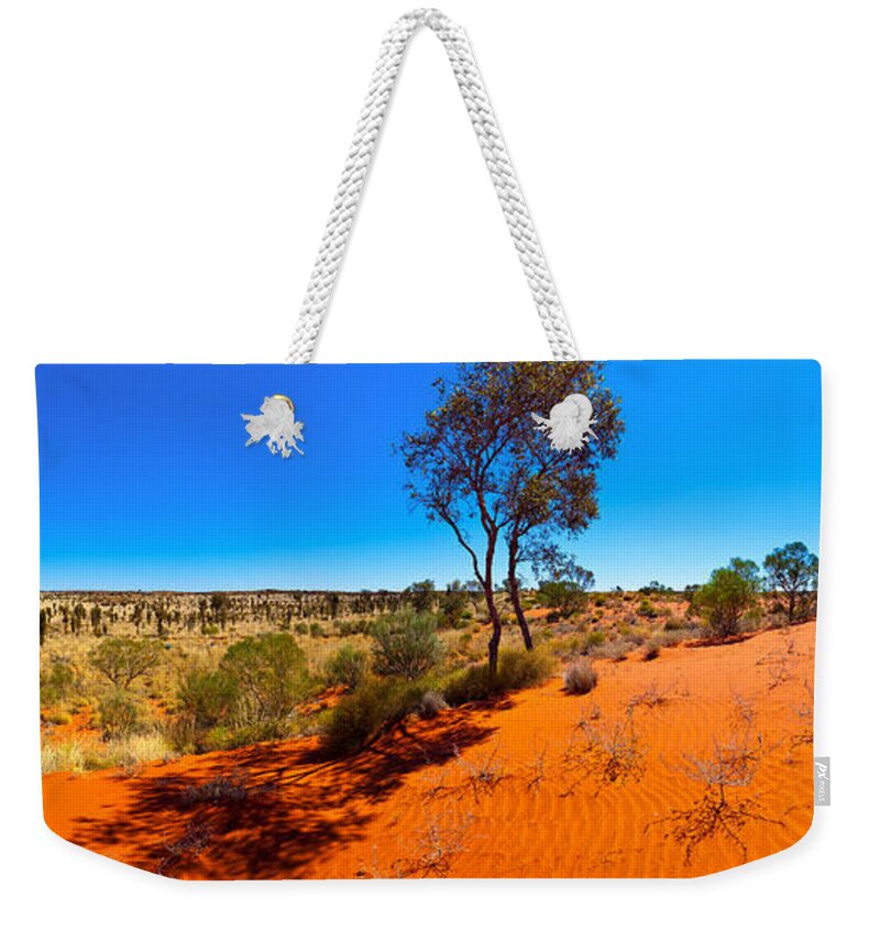 The Road To Uluru Outback Landscape Central Australia Australian Gum Tree Desert Arid Sand Dunes  Weekender Tote Bag featuring the photograph The Road to Uluru by Bill Robinson