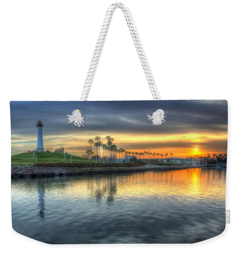 Amusement Weekender Tote Bag featuring the photograph The Sinking Sun by Heidi Smith