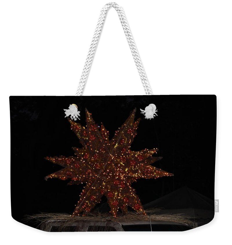 All Products Weekender Tote Bag featuring the photograph The Star by Lorna Maza