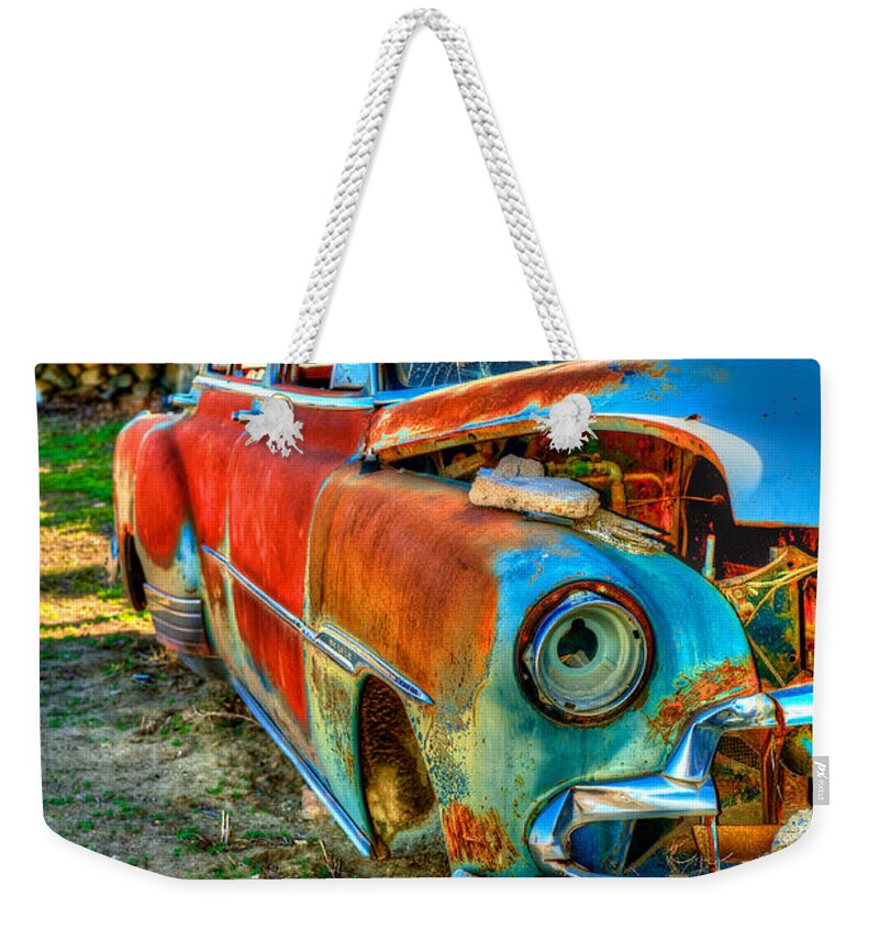 Thunder Mountain Indian Monument Weekender Tote Bag featuring the photograph The Tired Chevy 2 by Richard J Cassato