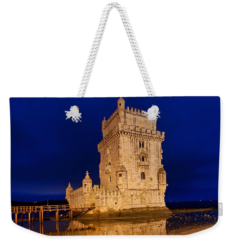  Weekender Tote Bag featuring the photograph The Tower of Belem in Lisbon at the Blue Hour by Mitchell R Grosky