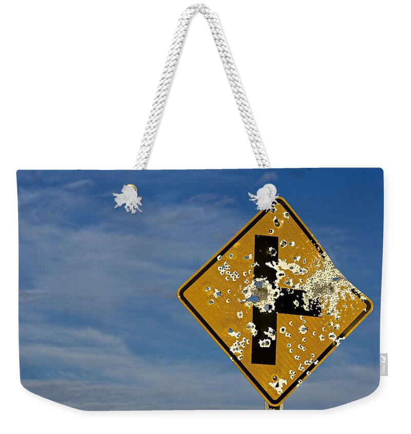 Street Sign Weekender Tote Bag featuring the photograph The Wild Wild West by Barbara Zahno