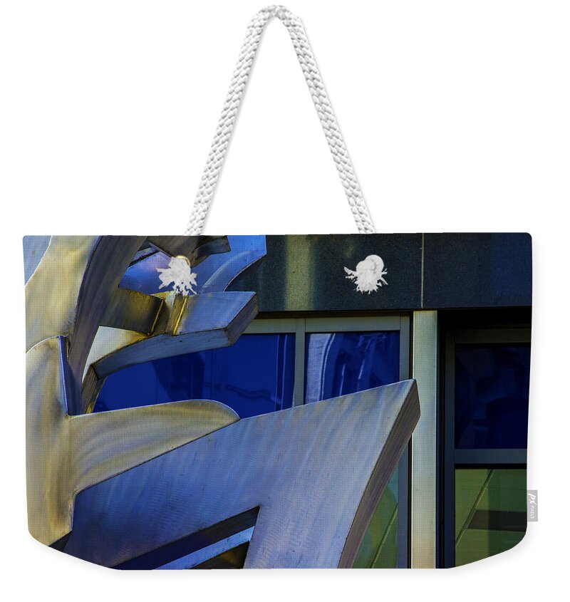  Weekender Tote Bag featuring the photograph The Wind by Raymond Kunst