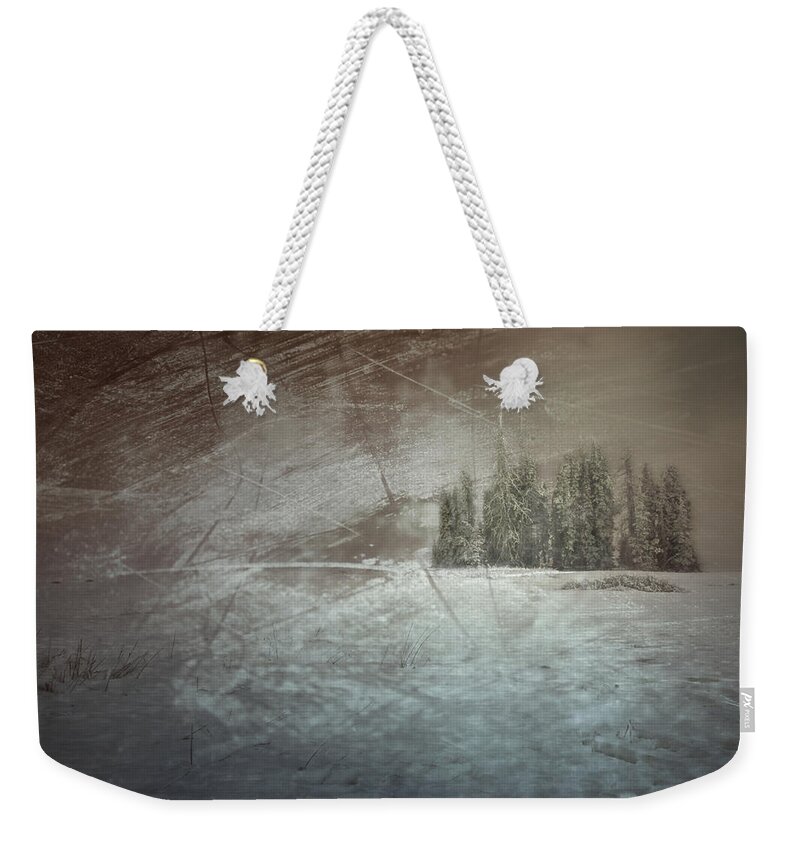 Cold Weekender Tote Bag featuring the photograph They Huddle by Mark Ross