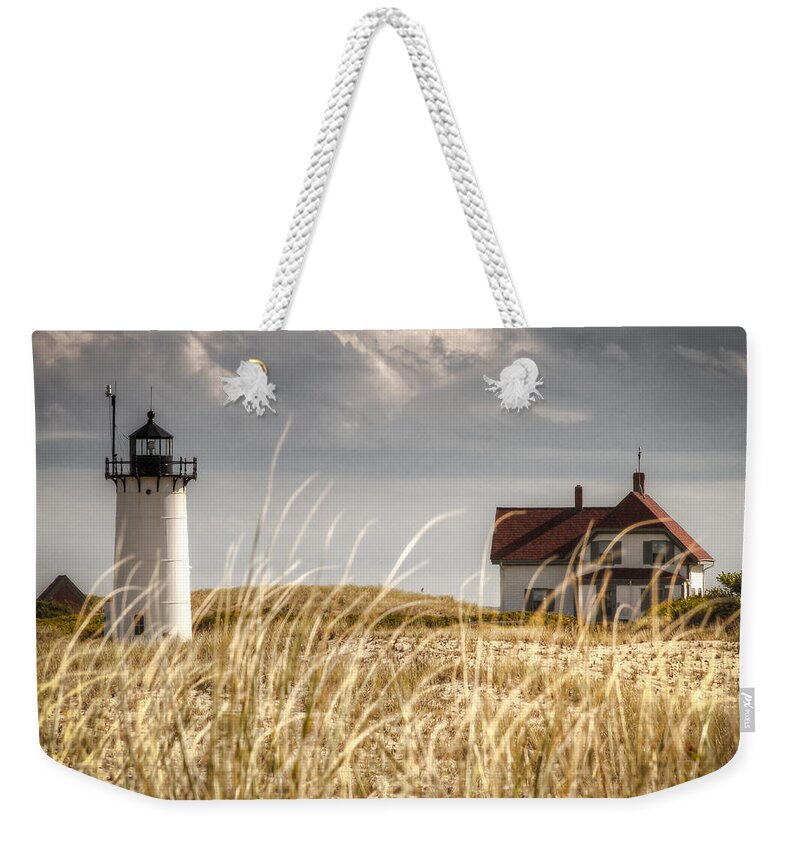 Race Point Light Weekender Tote Bag featuring the photograph Race Point Light Through the Grass by Brian Caldwell