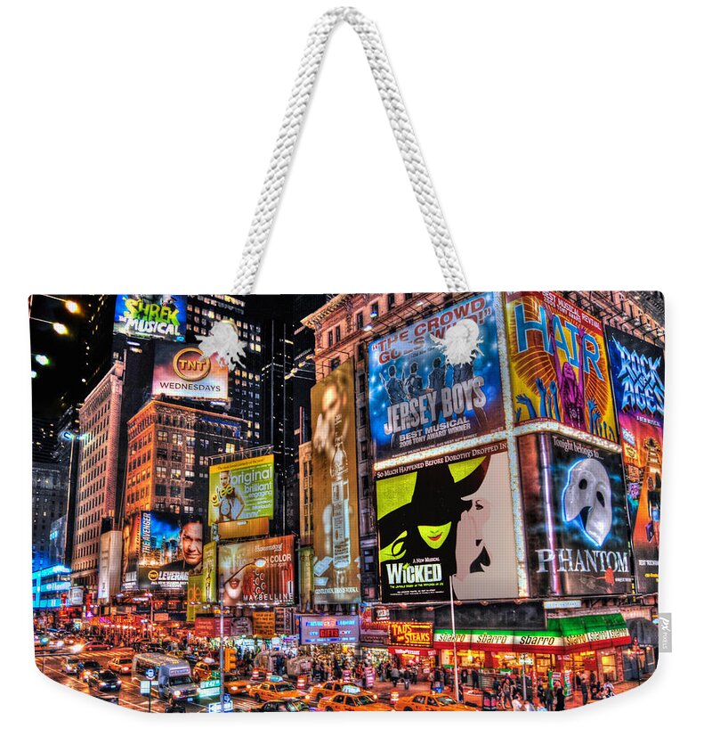 Manhattan Weekender Tote Bag featuring the photograph Times Square by Randy Aveille