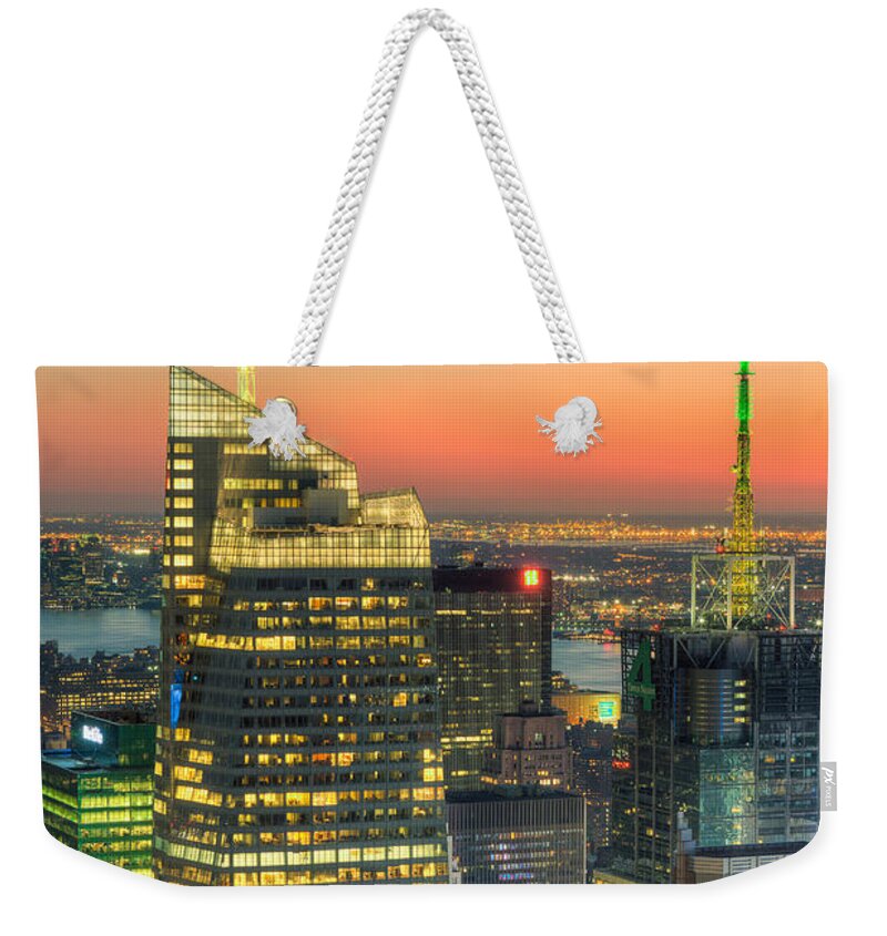 Clarence Holmes Weekender Tote Bag featuring the photograph Top of the Rock Twilight II by Clarence Holmes