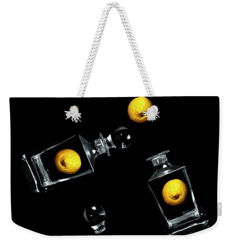 Lemons Weekender Tote Bag featuring the photograph Toss Me a Lemon by Diana Angstadt