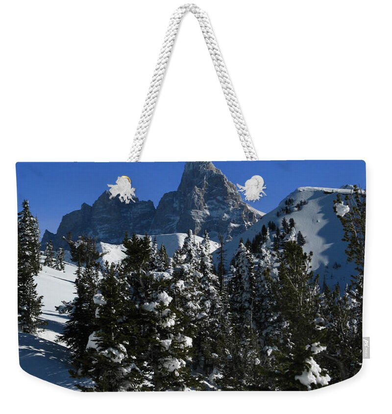 Grand Teton Weekender Tote Bag featuring the photograph Towering Above Lies the Grand by Raymond Salani III