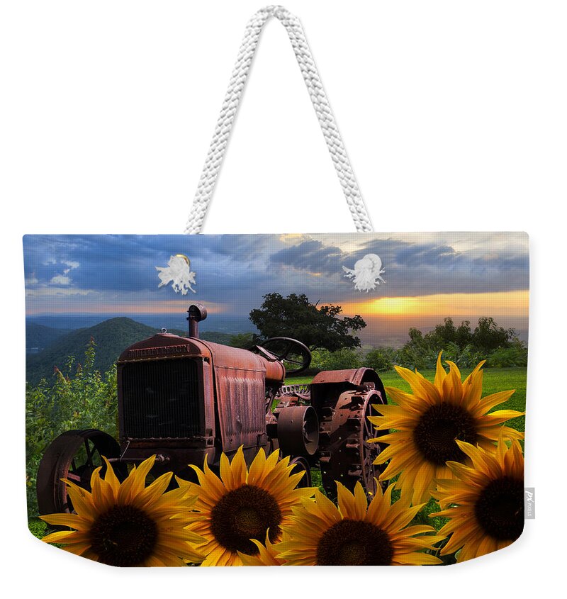 Appalachia Weekender Tote Bag featuring the photograph Tractor Heaven by Debra and Dave Vanderlaan