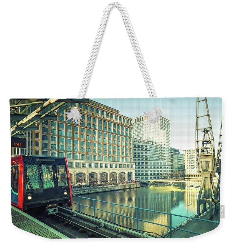 Downtown District Weekender Tote Bag featuring the photograph Train In Subway Station At Canary by Cirano83