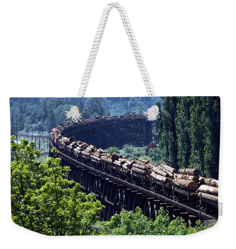 Transportation Weekender Tote Bag featuring the photograph Transporting Logs by Earl Roberge