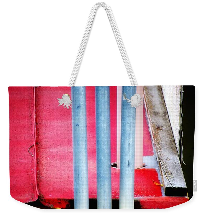 Newel Hunter Weekender Tote Bag featuring the photograph Triple Play by Newel Hunter