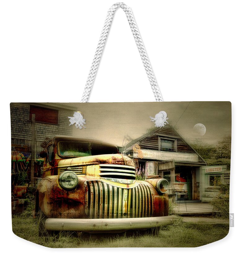 Truck Weekender Tote Bag featuring the photograph Truckyard by Diana Angstadt