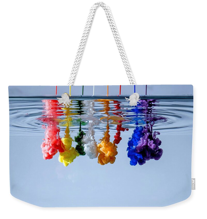 Mixing Weekender Tote Bag featuring the photograph True Colors by Antonio Iacobelli