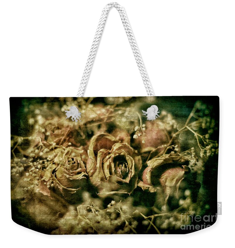 Roses Weekender Tote Bag featuring the photograph True Love Never Dies by Lois Bryan
